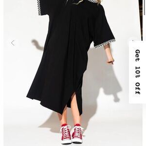 Stylish Black Dress with Checkered Accents